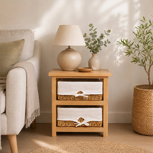 Wooden bedside storage unit with two maize baskets, lamp and neutral home decor