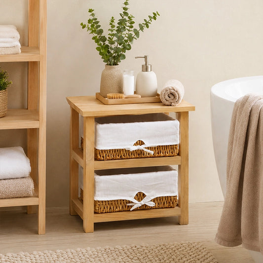 Wooden bathroom storage unit with two maize baskets, towels and toiletries