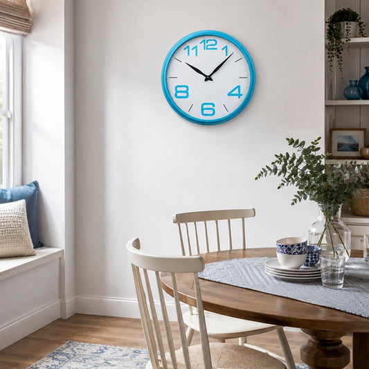 Blue plastic wall clock above dining table with plants and chairs