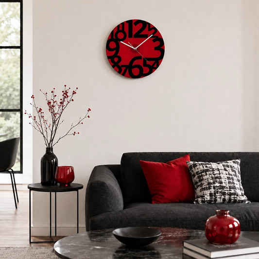 Red glass wall clock with bold black numbers in living room setting