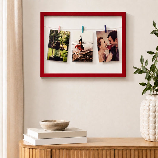 Red photo frame with multiple picture slots mounted on wall