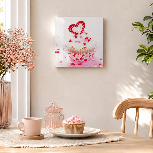 Cupcake glass wall print with pink and red design displayed in a bright dining area