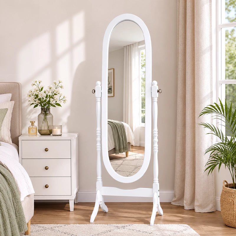 White wooden freestanding floor mirror with lights beside bedroom dresser