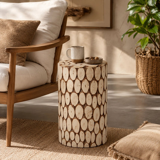 Decorative round accent table with wood slice design in neutral living room