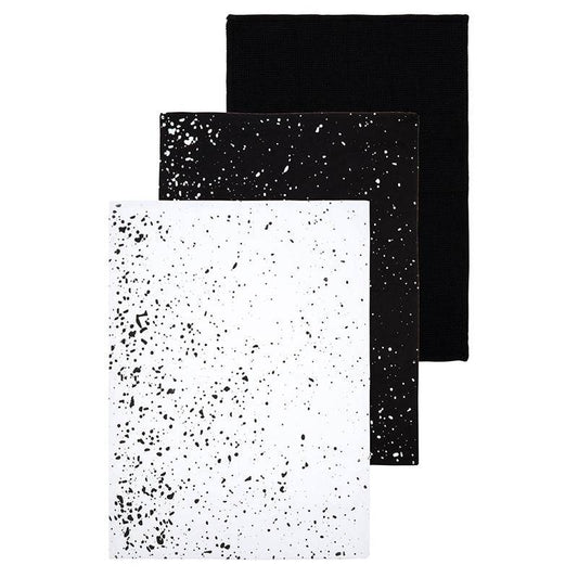 Set of 3 black and white tea towels including a solid black, black speckle on white, and white speckle on black design