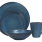 A stylish blue dinner set featuring plates, bowls, and cups arranged elegantly on a table.