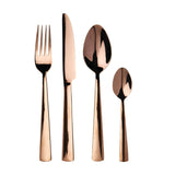 Cutlery set with a rose gold finish, including forks, knives, and spoons, elegantly arranged on a table.