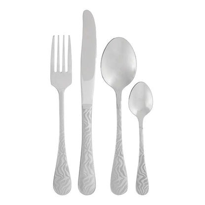 Stainless steel cutlery set with dinner forks, knives, and teaspoons arranged neatly on a table. 