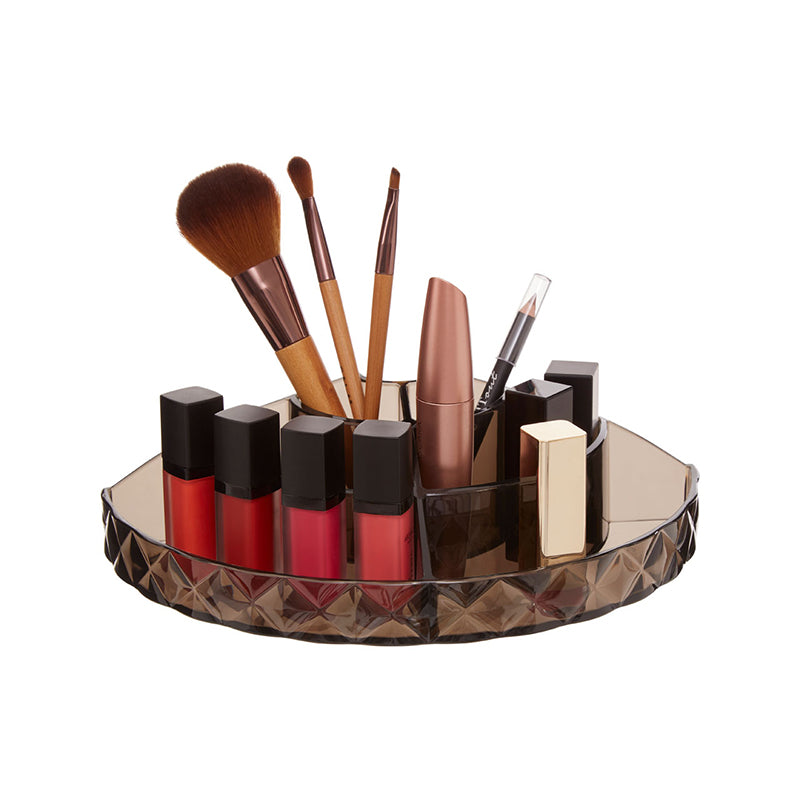 Stylish semi-round cosmetic organizer for makeup storage and organization.