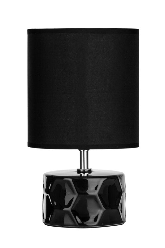 Table lamp for modern home decor, providing soft lighting and stylish ambiance.