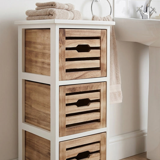 Close-up of white and wood 3-drawer storage chest with black handles