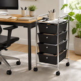 Black drawer trolley with wheels beside home office desk and chair