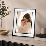 Black glass photo frame with modern border displaying family photo