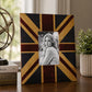 Black and gold photo frame with portrait picture beside plant and books