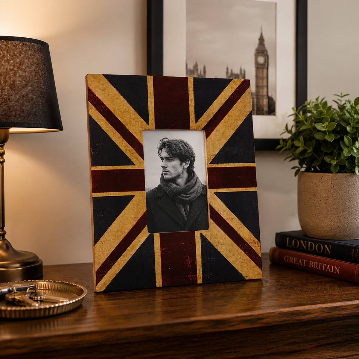 Black and gold 5x7 photo frame with geometric pattern on wooden table