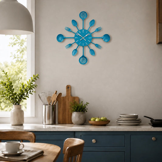 Blue cutlery wall clock with spoon and fork design above kitchen counter
