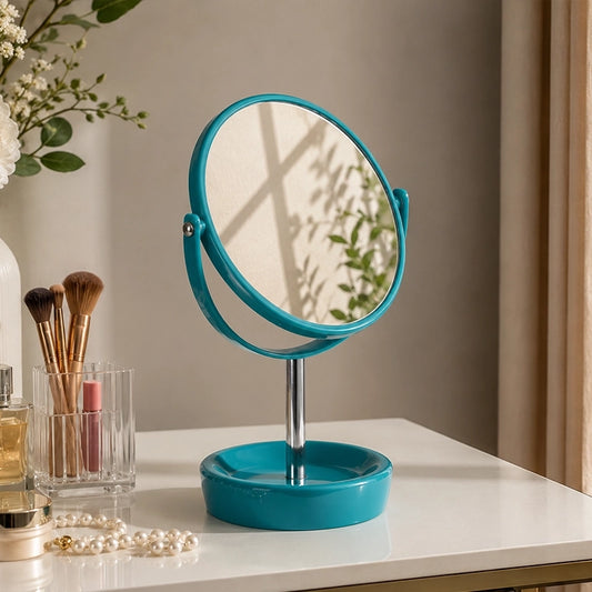 Blue tabletop mirror with round frame on bathroom vanity