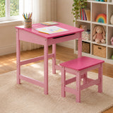 Pink kids desk and stool set with drawing paper in playroom