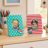 Colourful kids photo frame set with polka dot and pirate designs on wooden shelf