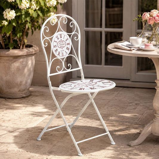 Cream metal folding garden chair with decorative floral seat design