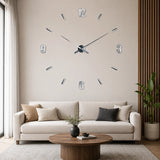 DIY mirrored wall clock with silver numbers above living room sofa