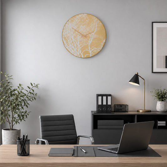 Gold finish plastic wall clock above home office desk and black chair