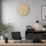 Gold finish plastic wall clock above home office desk and black chair
