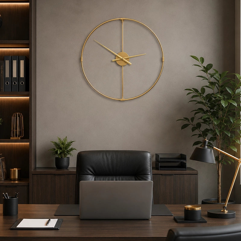 Gold metal wall clock above sofa in bright neutral living room
