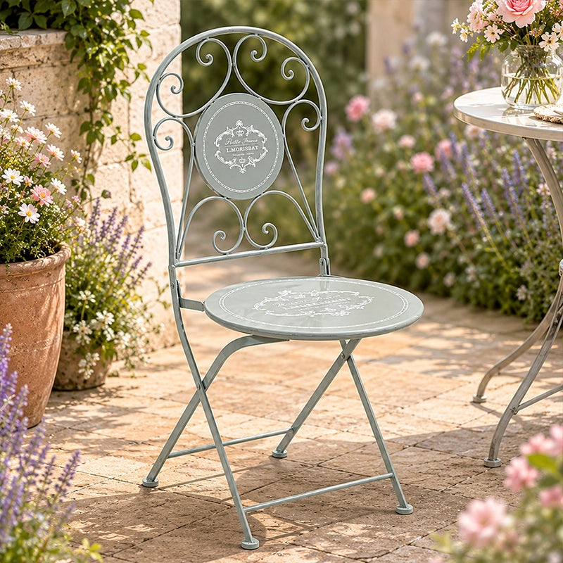 Grey metal folding garden chair with decorative floral backrest