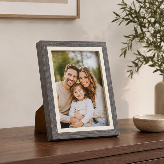 Grey and cream photo frame with modern border on tabletop