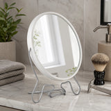 Large white shaving mirror on bathroom counter