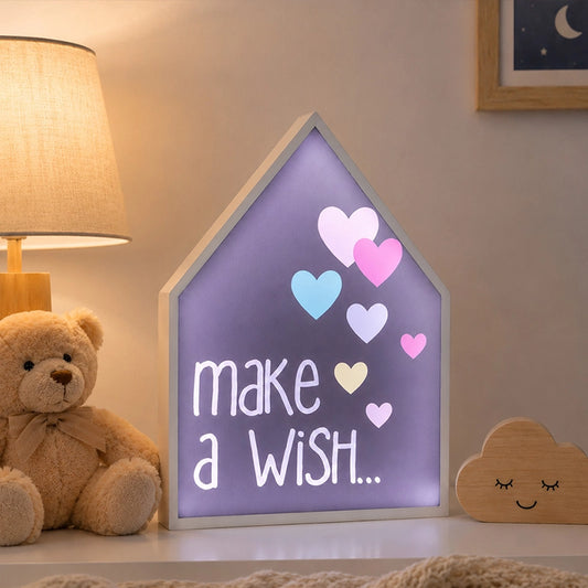 Make a wish LED light box with hearts on bedside table in kids room