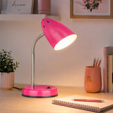 Pink desk lamp with EU plug on study table beside notebook and pencils