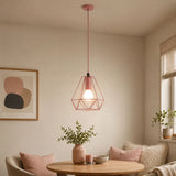 Pink metal pendant light hanging above sofa in modern living room
