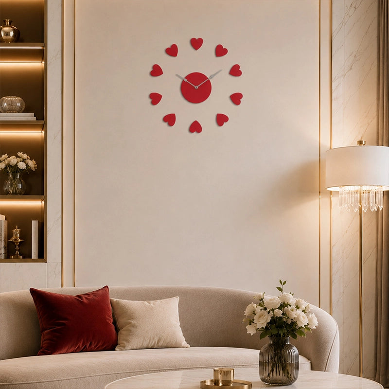 Red plastic heart wall clock above sofa in warm living room setting