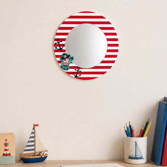 Red striped round wall mirror above desk with pencils and decor