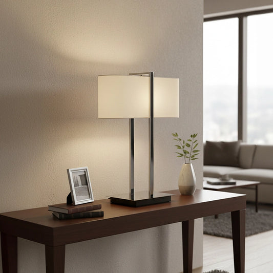 Silver table lamp with white shade on console table in living room