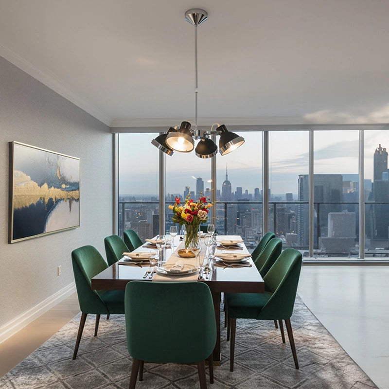 Silver and black pendant light over dining table in modern apartment