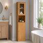 Tall wooden bathroom storage cabinet with shelves beside bathtub