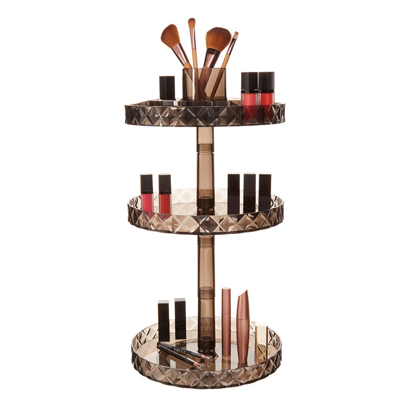 Three-tier makeup organizer for efficient storage and easy access to cosmetics.