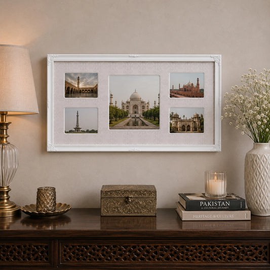White 5 photo collage frame with landmark photos above console table