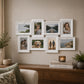 White 8 photo collage frame mounted above console table in living room