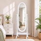 White wooden freestanding floor mirror with lights beside bedroom dresser