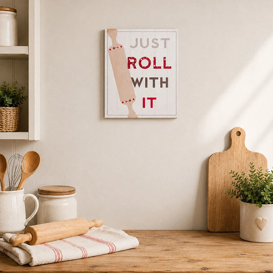 Wooden kitchen quote wall plaque with “Just Roll With It” lettering and rolling pin design