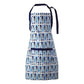 White kitchen apron with blue fish print pattern, navy blue straps and front pocket trim