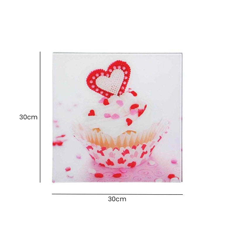Pink cupcake glass wall art showing product dimensions of 30cm high by 30cm wide