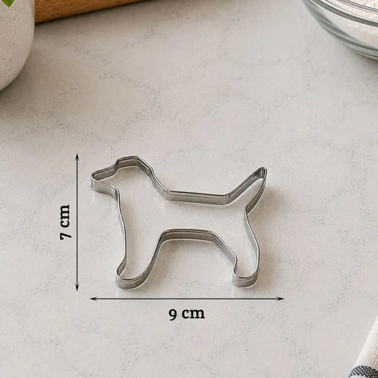 Metal dog cookie cutter showing its size of 9 cm wide and 7 cm tall