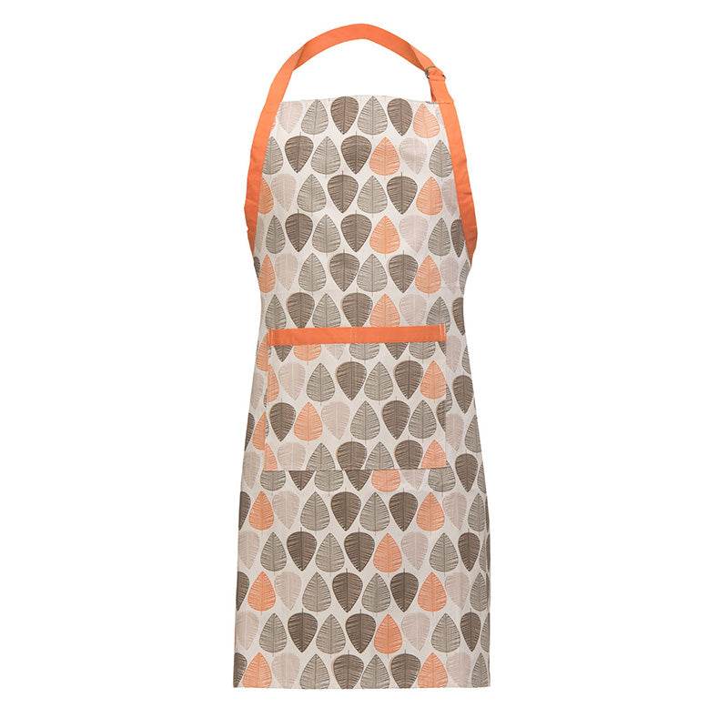Cream kitchen apron with orange and brown leaf print pattern, orange straps and front pocket trim on a white background