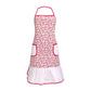 red kitchen apron with two front pockets, all-over red floral print on white cotton, red trim detail and white ruffle hem, UK imported