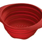 Red silicone collapsible colander shown empty on a white background.